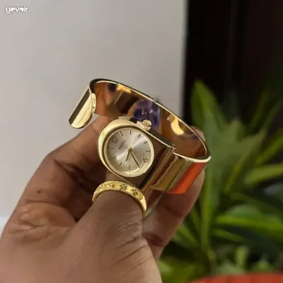 Women's bangle watch, gold and silver, 2