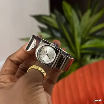 Women's bangle watch, gold and silver