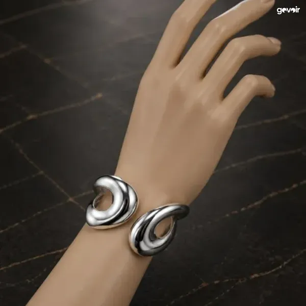 Chunky bangles, gold and silver, 2